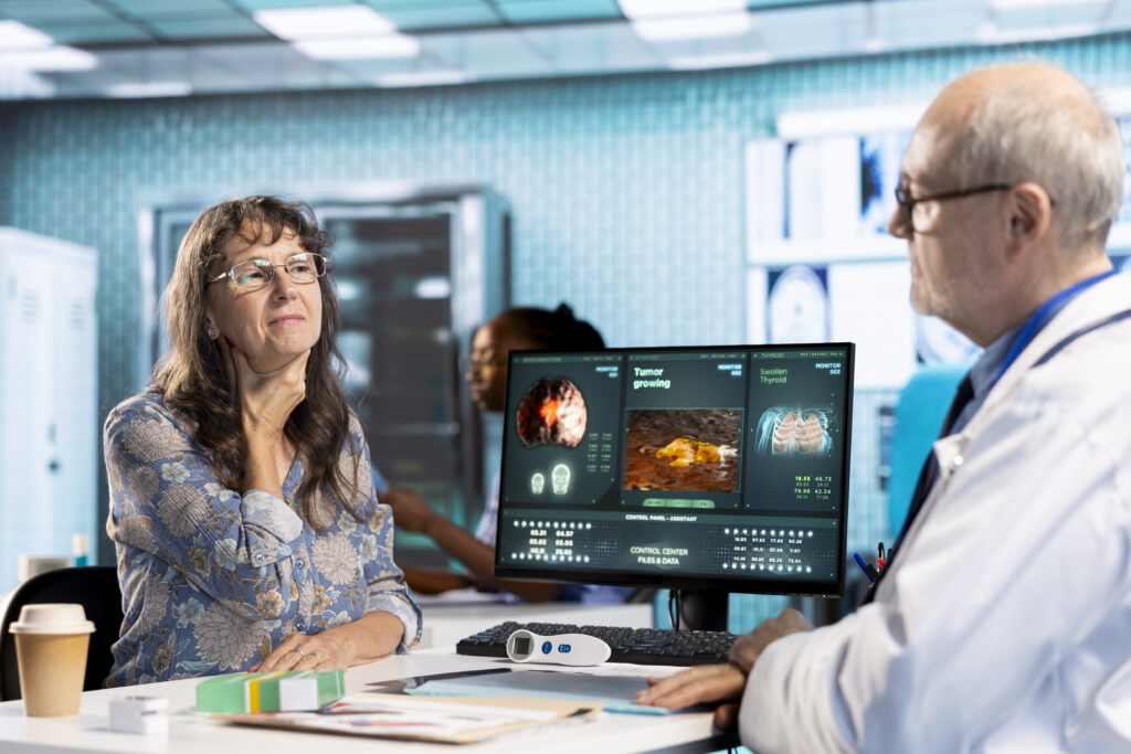 Senior female client struggling with a sore throat and inflammation, asking medic for some painkillers and anti inflammatory pills. Patient with swollen glands asking physician about new treatment.
